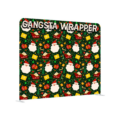 Gangsta Wrapper Christmas-themed backdrop with Santa Claus and presents on a green background.