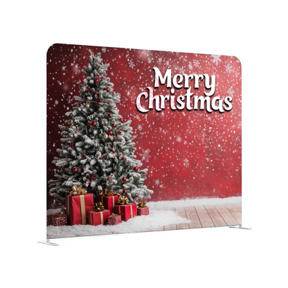 Christmas-themed backdrop with a tree, presents, and 'Merry Christmas' text on a red background.