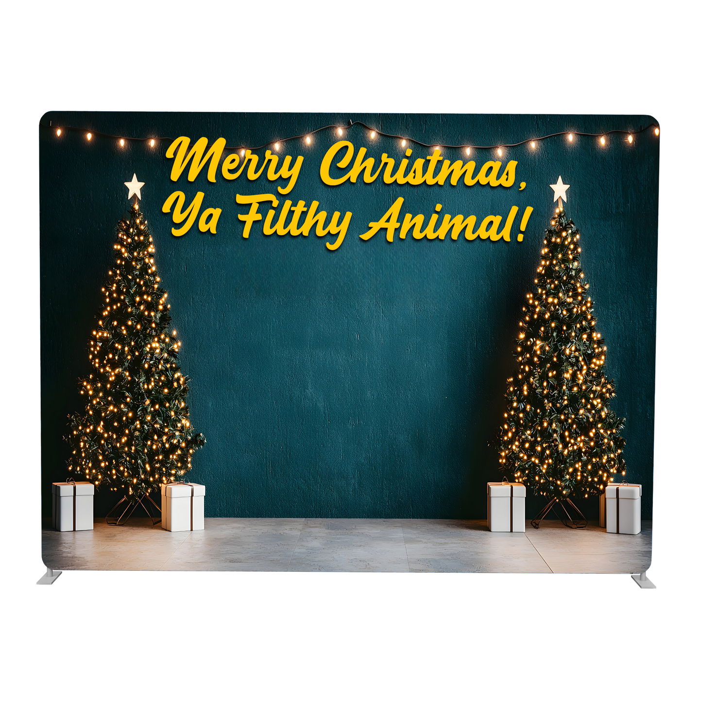 Christmas-themed backdrop with two decorated trees and a humorous Christmas message.