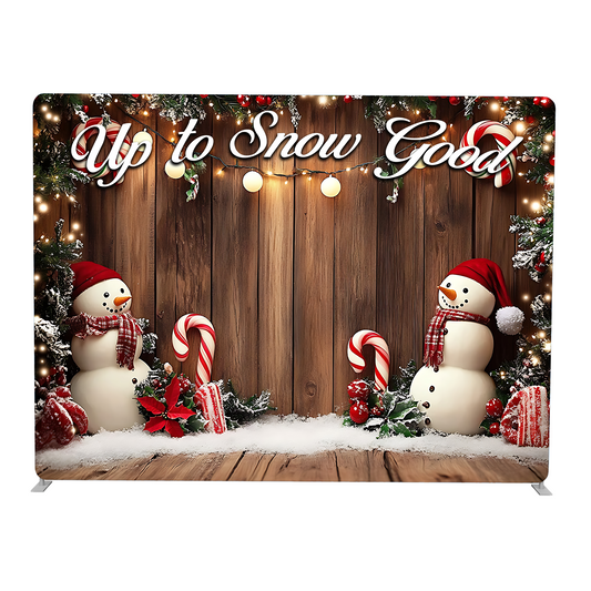 Christmas-themed backdrop with snowmen, candy canes, and decorative lights on a wooden background.